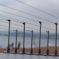 Defender® Bird Post and Wire Holders wires installed on a ledge using Defender® Fixing Silicone